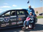 Fay and her driver.  The car has more stickers.