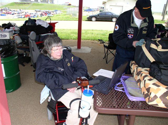 Here is Fay hard at work on her laptop in the cold wind at Heartland Park.